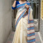 Nilambori Muslin – অফ হোয়াইট বেসে নীল-লালের ক্লাসিক ব্লক কাব্য